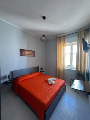 Letto o letti in una camera di Settetrequattro Rooms