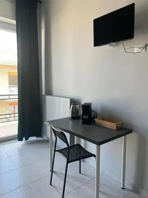 TV o dispositivi per l'intrattenimento presso Settetrequattro Rooms