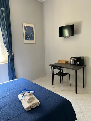 Letto o letti in una camera di Settetrequattro Rooms