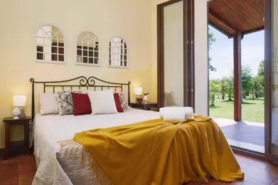 Letto o letti in una camera di Casale della Pergola eco-friendly pool