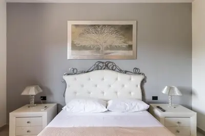 Letto o letti in una camera di Villa Badessa