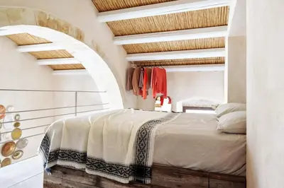 Letto o letti in una camera di Casa Arco Modica