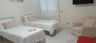 Letto o letti in una camera di Giloma House