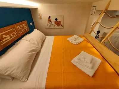 Letto o letti in una camera di Ciaurimari Sicilian Suite con Terrazza