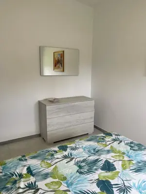 Letto o letti in una camera di Villa Baia del Silenzio