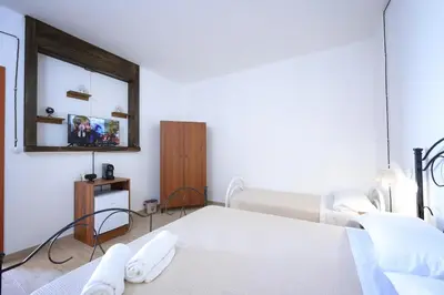 Letto o letti in una camera di Villa Monte Sereno