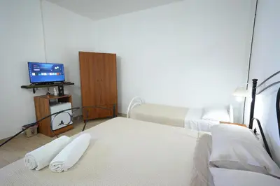 Letto o letti in una camera di Villa Monte Sereno