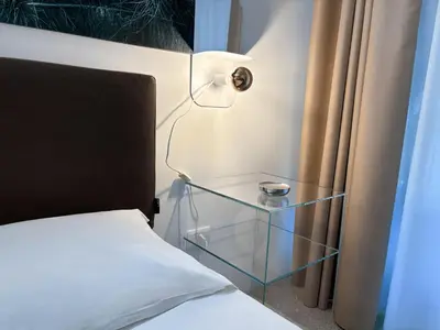 Letto o letti in una camera di CASA ARIEL Siracusa