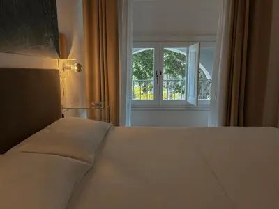 Letto o letti in una camera di CASA ARIEL Siracusa