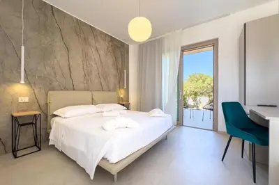 Letto o letti in una camera di Il Crepuscolo Marispica