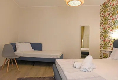 Letto o letti in una camera di CasAmuri Exclusive Apartments