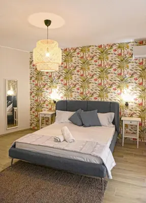 Letto o letti in una camera di CasAmuri Exclusive Apartments