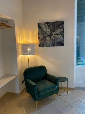 Area soggiorno di Ciauru Apartment Ortigia