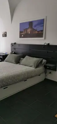 Letto o letti in una camera di Grimaldi Houses
