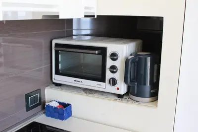 Cucina o angolo cottura di appartamento Aretusa