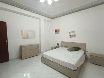 Letto o letti in una camera di Jenny