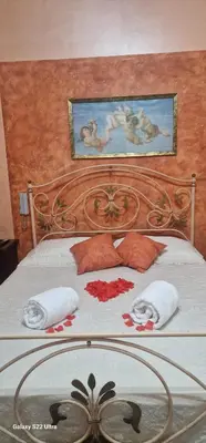 Letto o letti in una camera di Villa zefiro