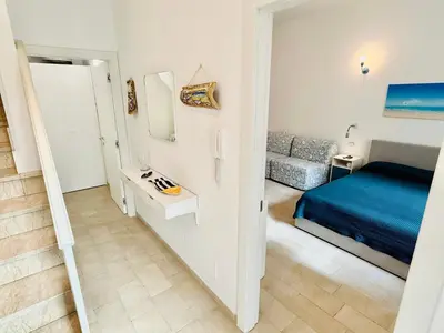 Letto o letti in una camera di La casa di Tina a due passi dal centro