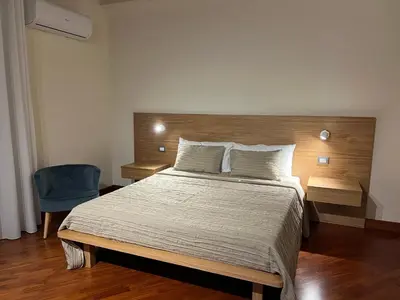 Letto o letti in una camera di Dimora Bellini