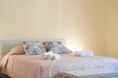 Letto o letti in una camera di MaGiGa