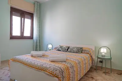 Letto o letti in una camera di MaGiGa