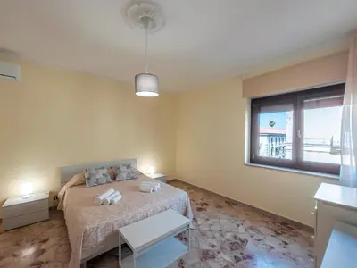 Letto o letti in una camera di MaGiGa