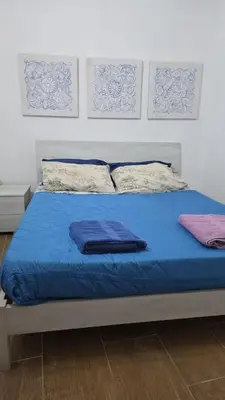 Letto o letti in una camera di Dreams Catania