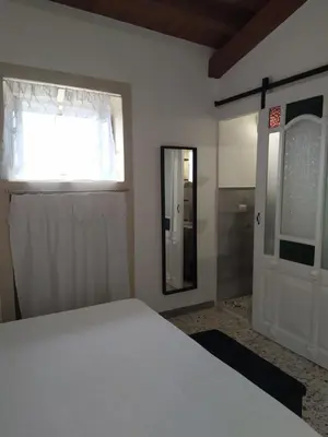 Letto o letti in una camera di La casa di Paolina