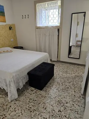 Letto o letti in una camera di La casa di Paolina