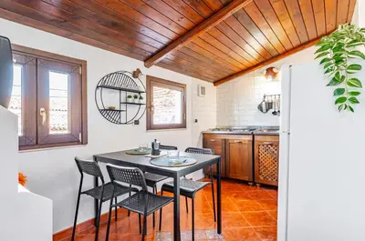 Cucina o angolo cottura di GuestHost - Cute Apartment in San Berillo