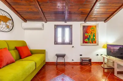 Area soggiorno di GuestHost - Cute Apartment in San Berillo