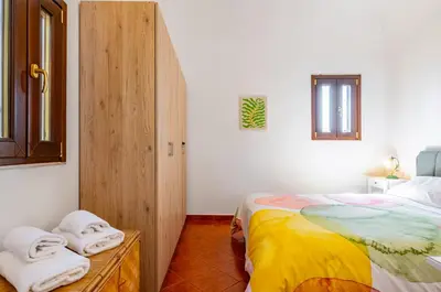 Letto o letti in una camera di GuestHost - Cute Apartment in San Berillo
