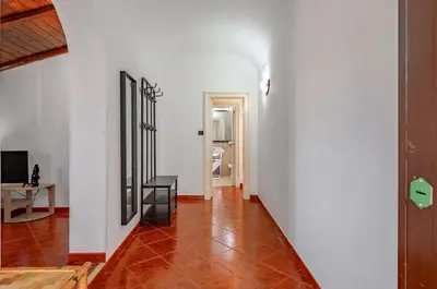 TV o dispositivi per l'intrattenimento presso GuestHost - Cute Apartment in San Berillo