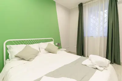 Letto o letti in una camera di Al Palazzetto - Fichi d'india