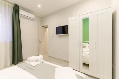 Letto o letti in una camera di Al Palazzetto - Fichi d'india