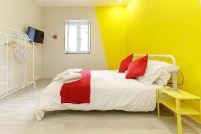 Letto o letti in una camera di Al Palazzetto - Il Carretto
