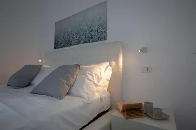 Letto o letti in una camera di Casa Niuccia Ortigia vista mare