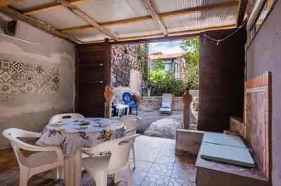 Area soggiorno di SICILIAN MOOD - Garden House in the city ceter