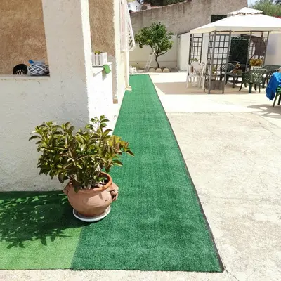 Giardino di Marty's Home - Villetta vicino al mare