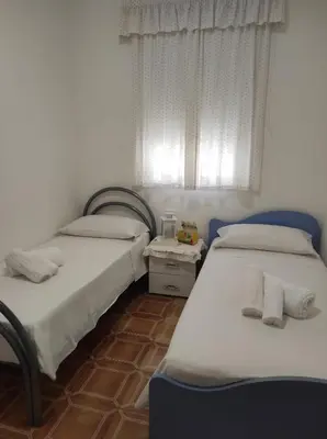 Letto o letti in una camera di Marty's Home - Villetta vicino al mare