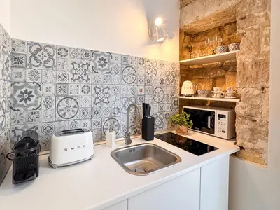 Cucina o angolo cottura di IBLA Luxury Suite