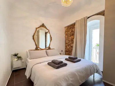 Letto o letti in una camera di IBLA Luxury Suite