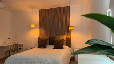 Letto o letti in una camera di MALAGO Apartment