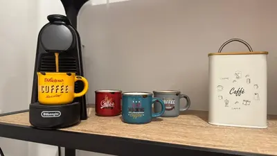 Set per la preparazione di tè e caffè presso MALAGO Apartment