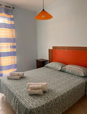 Letto o letti in una camera di Casa vacanze Alessandra