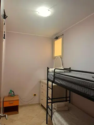 Letto o letti in una camera di Casa vacanze Alessandra