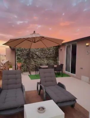 Area soggiorno di Grace Home