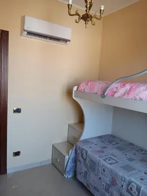 Letto o letti in una camera di Casa Adelaide