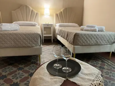 Letto o letti in una camera di Trewhella Home, Centro Storico, Duomo