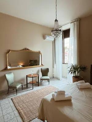 Letto o letti in una camera di Charme Siciliano nel centro storico di Catania a Casa Ciuciù